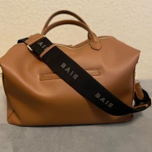 Mina Baie full terra Emmy bag with matching BAIE strap